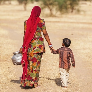 "Indian woman carrying water from the well, Rajasthan"